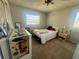Cozy bedroom with a comfortable bed, dresser and two large windows at 240 Slade Dr, Longwood, FL 32750
