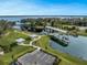 Community waterfront access featuring a dock, boat slip, and covered picnic areas at 2741 Nottel Dr, St Cloud, FL 34772