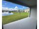 A view of a pond and a backyard at 2741 Nottel Dr, St Cloud, FL 34772