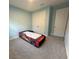 bedroom with a unique race car bed and closet at 2741 Nottel Dr, St Cloud, FL 34772