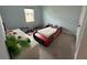 bedroom with a race car bed, window, and neutral-colored walls at 2741 Nottel Dr, St Cloud, FL 34772