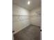 Walk-in closet with wire shelving and carpeted flooring at 2741 Nottel Dr, St Cloud, FL 34772