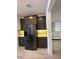 Kitchen with modern cabinetry, stainless steel refrigerator, and stylish tile backsplash at 2741 Nottel Dr, St Cloud, FL 34772