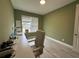 Home office space with a desk, natural light, and ample workspace at 2741 Nottel Dr, St Cloud, FL 34772