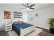 Charming bedroom with nautical theme and decor, white furniture and wood-look floors at 2965 Slough Creek Dr, Kissimmee, FL 34744