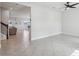 Open-concept living space with tile flooring that flows into dining and living areas at 2965 Slough Creek Dr, Kissimmee, FL 34744