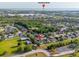 Aerial view of the neighborhood, home and nearby St. Johns River at 305 Kays Landing Dr, Sanford, FL 32771