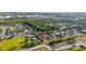 Aerial view of the property and its neighborhood surrounded by lush greenery at 305 Kays Landing Dr, Sanford, FL 32771