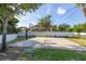 Outdoor basketball court in a well-maintained community setting, perfect for recreation and exercise at 305 Kays Landing Dr, Sanford, FL 32771