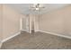This bright bedroom features a ceiling fan and hardwood floors, capturing cozy comfort at 305 Kays Landing Dr, Sanford, FL 32771