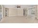 Open floor plan with tile flooring and neutral paint, perfect for entertaining at 305 Kays Landing Dr, Sanford, FL 32771