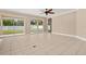 Open living room with large glass doors that provides lots of natural light at 305 Kays Landing Dr, Sanford, FL 32771