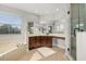 Bright main bathroom with double vanity, soaking tub, and glass shower at 305 Kays Landing Dr, Sanford, FL 32771