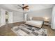 Spacious main bedroom showcases modern finishes and a decorative ceiling fan at 305 Kays Landing Dr, Sanford, FL 32771