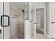 Modern shower with frameless glass door and decorative mosaic details at 305 Kays Landing Dr, Sanford, FL 32771