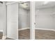 Dual walk-in closets feature sliding barn doors, built-in lighting and ventilated shelving at 305 Kays Landing Dr, Sanford, FL 32771