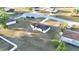 Aerial view showcasing a well-maintained home, spacious yard, and neighborhood layout at 312 Oak Track Ter, Ocala, FL 34472