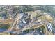 Scenic aerial view of a home located near a school and athletic facilities at 312 Oak Track Ter, Ocala, FL 34472