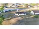 Aerial view of a cozy home with a spacious yard nestled in a friendly neighborhood at 312 Oak Track Ter, Ocala, FL 34472