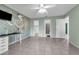 Large bedroom with unique wall decor, and access to the bathroom and closet at 3205 Clewiston St, Deltona, FL 32738