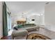 Spacious and stylish living area with views into the dining area, creating an open and inviting atmosphere at 3205 Clewiston St, Deltona, FL 32738