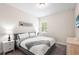 Cozy bedroom features neutral paint, carpet, and great natural light at 416 Southfield St, Kissimmee, FL 34747