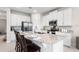 Modern kitchen features stainless steel appliances and a granite island at 416 Southfield St, Kissimmee, FL 34747