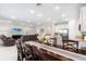 Spacious open-concept living and dining area with tile floors and recessed lighting at 416 Southfield St, Kissimmee, FL 34747