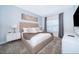 Comfortable bedroom with a large bed, soft lighting, and ample space, perfect for relaxation at 4188 Paragraph Dr, Kissimmee, FL 34746