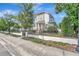 Charming two-story home with manicured front yard and gated entrance at 441 N Capen Ave, Winter Park, FL 32789