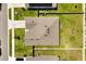 Rooftop view of a well maintained home and backyard, also shows neighboring properties, and their relation to one another at 445 Auburn Grove Pl, Auburndale, FL 33823