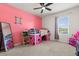Vibrant bedroom with loft bed, chalkboard, full mirror and a cute kitchen set at 445 Auburn Grove Pl, Auburndale, FL 33823