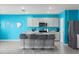 Bright kitchen featuring granite countertops, stainless steel appliances, a breakfast bar, and tiled flooring at 445 Auburn Grove Pl, Auburndale, FL 33823