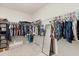 Spacious walk-in closet with ample shelving and hanging space at 445 Auburn Grove Pl, Auburndale, FL 33823
