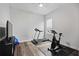 Clean room furnished with exercise equipment, creating a private workout space at 459 Dancing Water Dr, Winter Springs, FL 32708