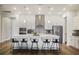 Elegant kitchen with a spacious island, pendant lighting, stainless steel appliances, and sleek cabinetry at 459 Dancing Water Dr, Winter Springs, FL 32708