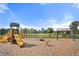 Community playground with slides, swings, and play equipment overlooking the lake at 459 Dancing Water Dr, Winter Springs, FL 32708