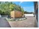 Backyard featuring a gazebo, stone pavers, manicured landscaping, and privacy fence at 460 Crownclover Ave, Orlando, FL 32828