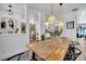 A modern dining room featuring pendant lights, decor, and an open layout concept at 460 Crownclover Ave, Orlando, FL 32828