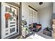 A beautifully decorated front porch with seating and decorative plants at 460 Crownclover Ave, Orlando, FL 32828
