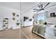 Bright bedroom features ample natural light, view of the pond, and mirrored wall at 460 Crownclover Ave, Orlando, FL 32828