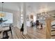 Open layout featuring a dining area, office, and a cohesive design with luxury vinyl plank flooring at 460 Crownclover Ave, Orlando, FL 32828