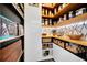 Pantry boasts custom shelves, woven baskets, and stylish geometric backsplash at 460 Crownclover Ave, Orlando, FL 32828