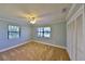 Comfortable bedroom offering carpet, closet, and two windows at 505 S Cooper St, New Smyrna Beach, FL 32169
