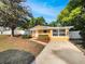 Charming single-story home with manicured landscaping at 5939 Stokes Rd, Lakeland, FL 33812