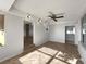 Bright living room with tile floors and easy access to other rooms at 5939 Stokes Rd, Lakeland, FL 33812