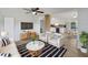 Bright living room features a modern design, stylish furnishings and natural light at 5939 Stokes Rd, Lakeland, FL 33812
