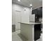 Modern kitchen with island and stainless steel appliances, and granite counter tops at 6863 Tussilago Way, Orlando, FL 32822