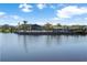 Beautiful community lake featuring a lounge area and plenty of room for neighborhood residents at 779 Firerock Ln, Debary, FL 32713
