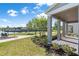 Stunning community lake view from the covered patio, perfect for relaxing and enjoying the scenery at 779 Firerock Ln, Debary, FL 32713